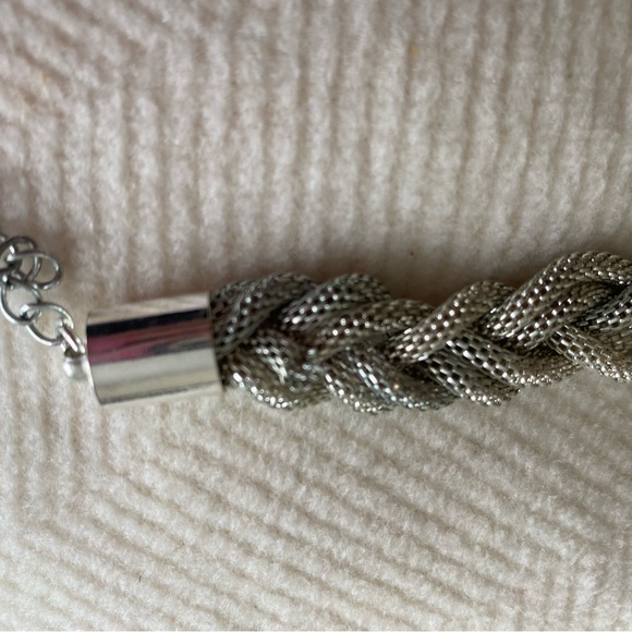 Cute Necklace Silver-tone braided, lightweight. Lays flat. Looks good. - Picture 6 of 6
